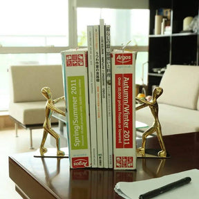 Serre livre homme en métal - Coussin De Lecture