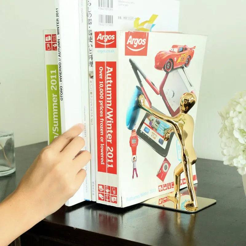 Serre livre homme en métal - Coussin De Lecture